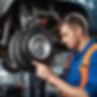 Mechanic inspecting a vehicle's brake system