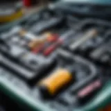 Comprehensive car maintenance tools laid out on a workshop table