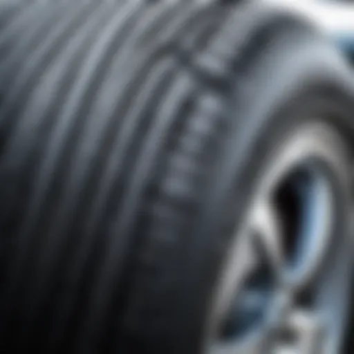 Close-up of a car's tire showing wear patterns