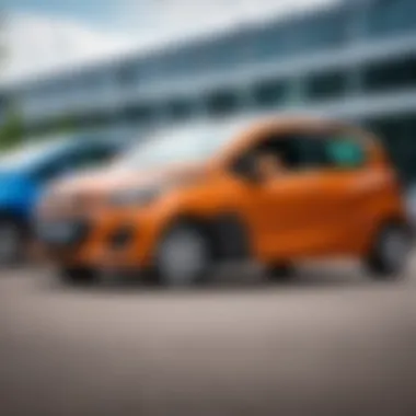 Chevrolet Matiz parked beside a modern car