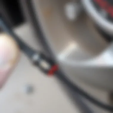 Worn Handbrake Cable Comparison Old handbrake cable showing wear