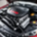 Under the hood of a Kia Sportage showcasing engine components.