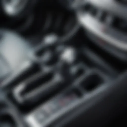 Location of the parking brake lever in a Kia Sportage interior