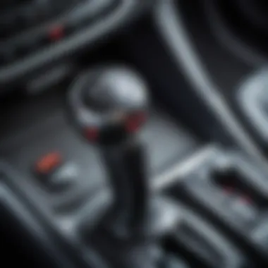 A close-up of a car's CVT gear shift lever