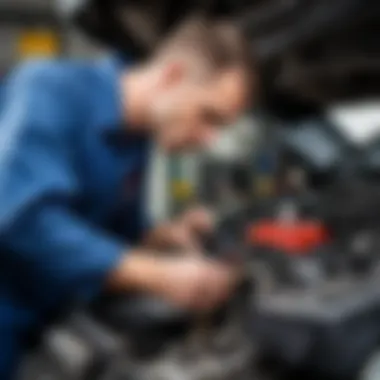 Mechanic checking oil levels in a car transmission