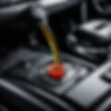 Close-up view of Nissan X-Trail engine oil dipstick showing oil level