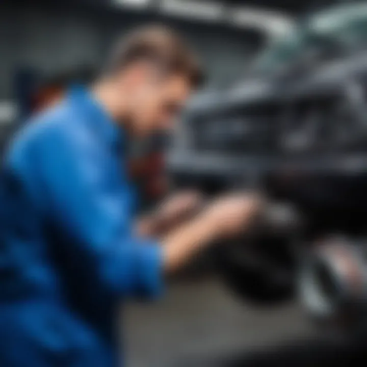 Mechanic examining vehicle transmission