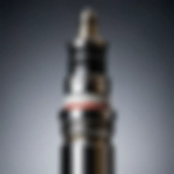 Close-up of a spark plug showing wear and tear