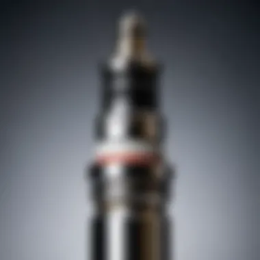 Visual Analysis of Spark Plug Wear Close-up of a spark plug showing wear and tear