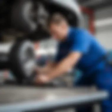 Mechanic working on a vehicle with newly sourced parts