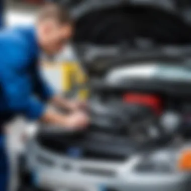 Mechanic inspecting the engine bay of a Ford Focus 2