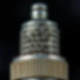 Carbon Deposits on Spark Plug Close-up view of spark plug showing carbon deposits