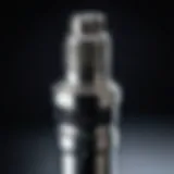 Close-up of a spark plug showing wear and tear