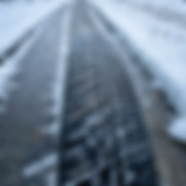 Close-up of tire tracks on icy pavement