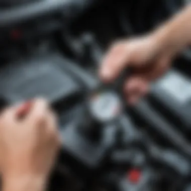 Mechanic checking power steering fluid level